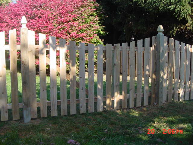 scalloped wooden fence