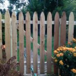 wood fencing with flowers