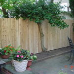 solid flat wood fence
