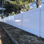 white vinyl privacy fence