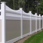 white vinyl fence with beige highlights