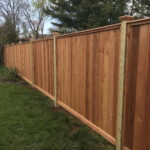 wooden privacy fence build around pool