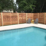 pool and wooden privacy fence